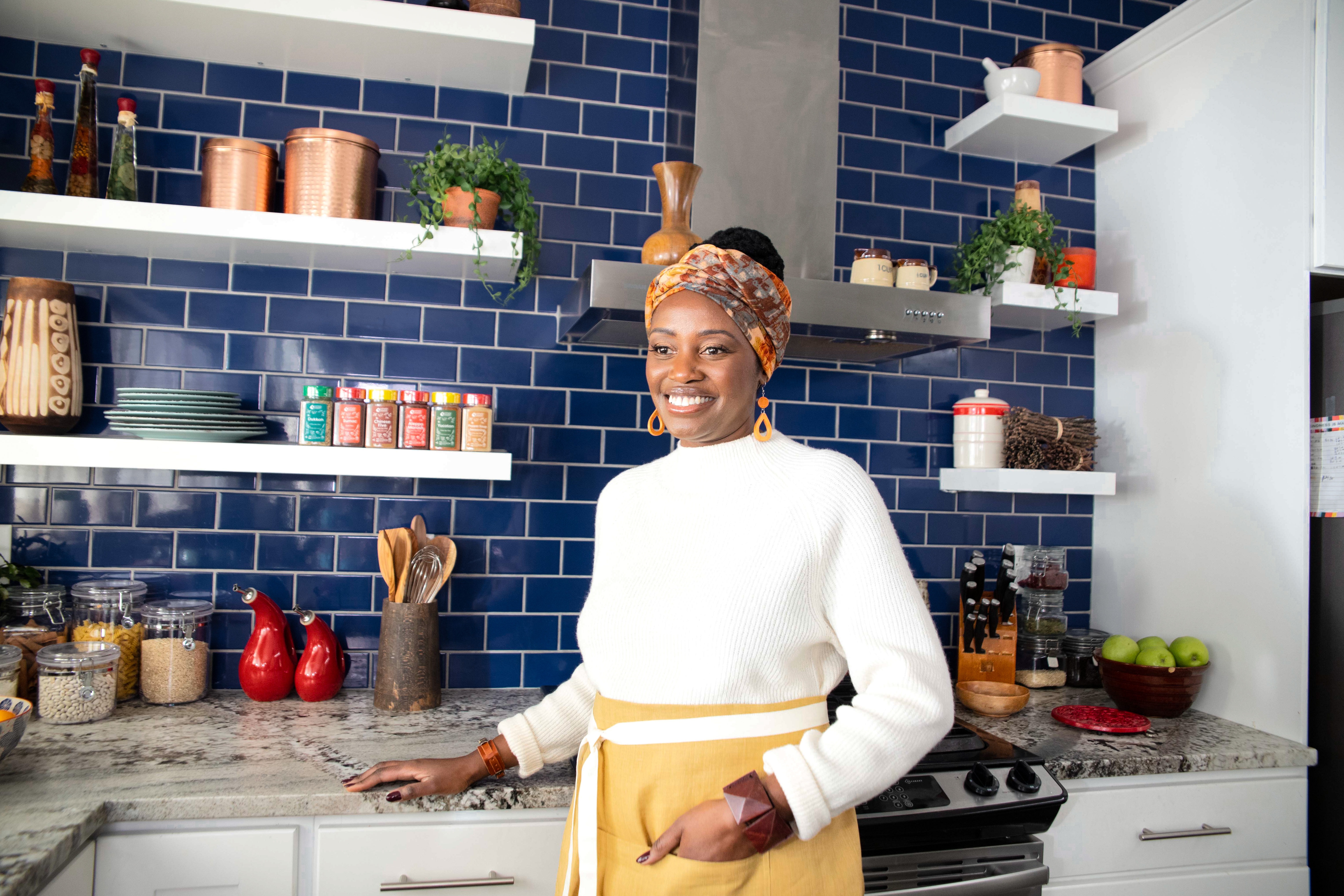 Sylvia, founder of USimplySeason, in her kitchen